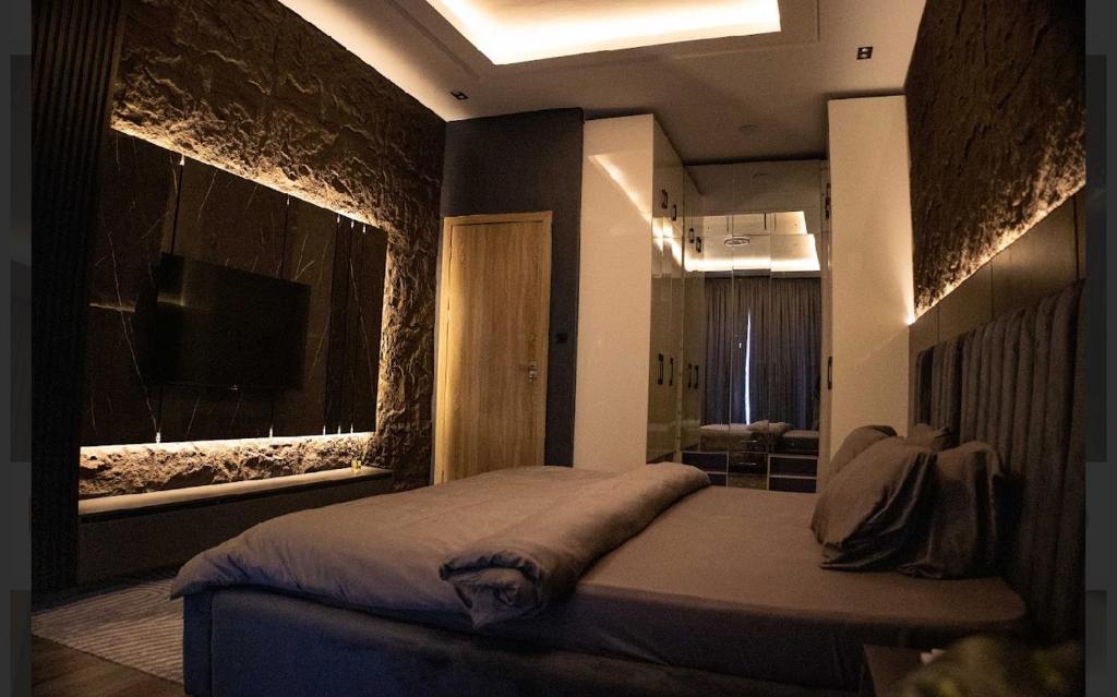 Postel nebo postele na pokoji v ubytování Tinapra properties