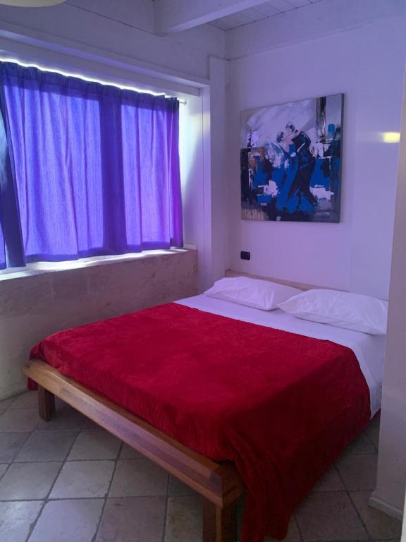 Postel nebo postele na pokoji v ubytování Le Tre Civette