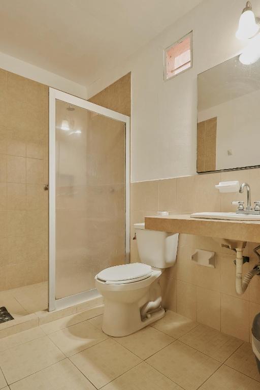 Koupelna v ubytování Hotel Cervantino