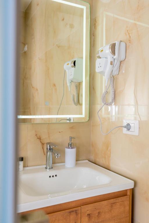 Koupelna v ubytování Hotel Shkodra Comfort