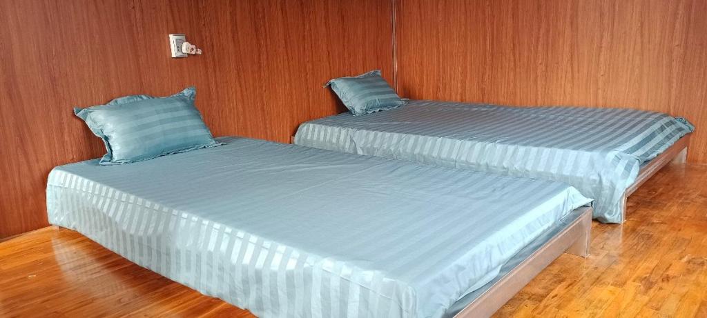 Postel nebo postele na pokoji v ubytování LÝ GIA HOMESTAY