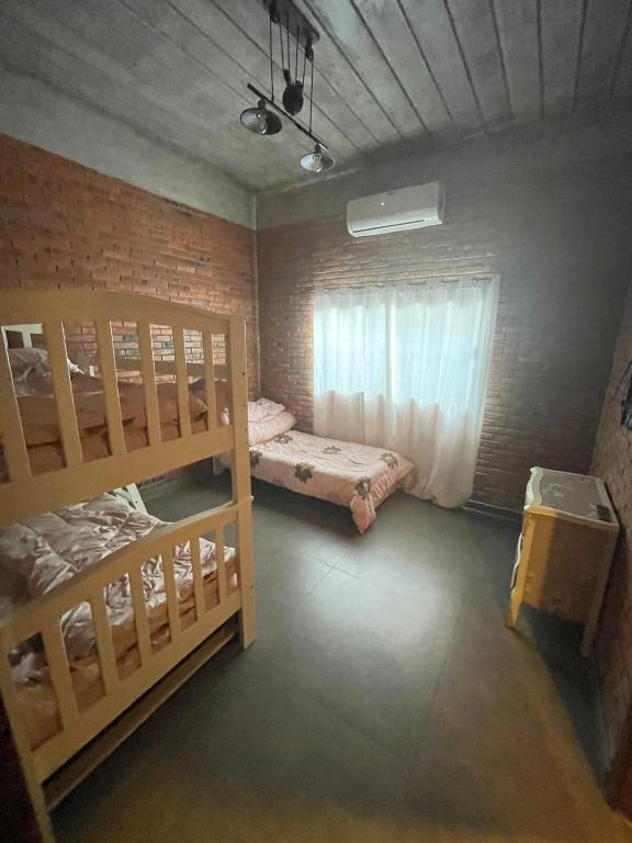 Postel nebo postele na pokoji v ubytování Amplia, moderna y tranquila casa