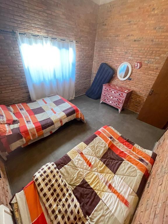 Postel nebo postele na pokoji v ubytování Amplia, moderna y tranquila casa