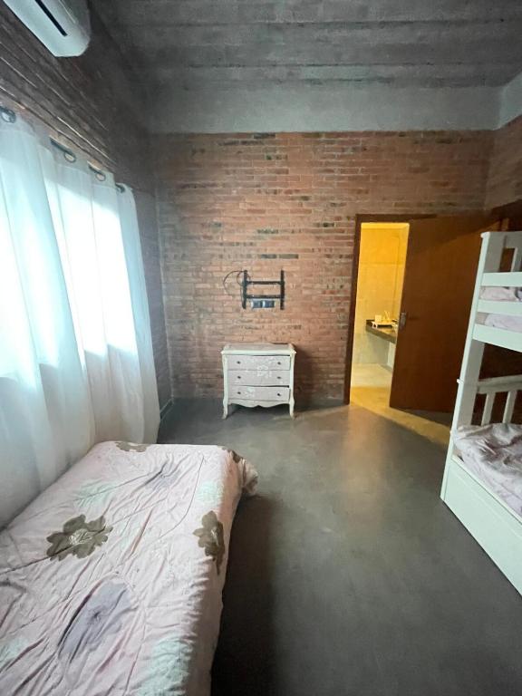 Postel nebo postele na pokoji v ubytování Amplia, moderna y tranquila casa