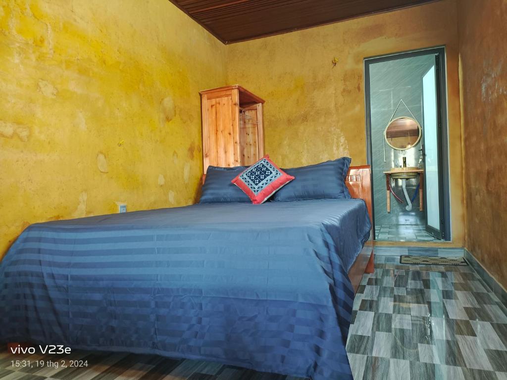 Postel nebo postele na pokoji v ubytování LÝ GIA HOMESTAY