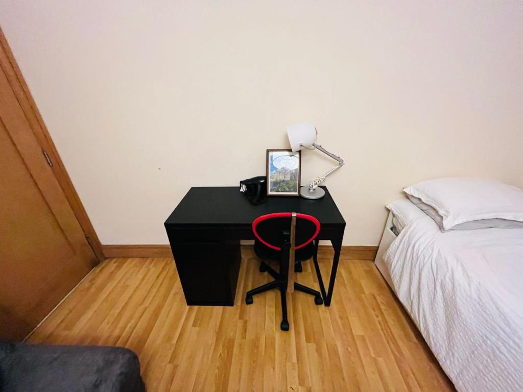 Postel nebo postele na pokoji v ubytování Habitación Cuádruple