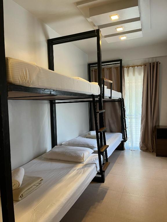 Postel nebo postele na pokoji v ubytování Gabi Villa