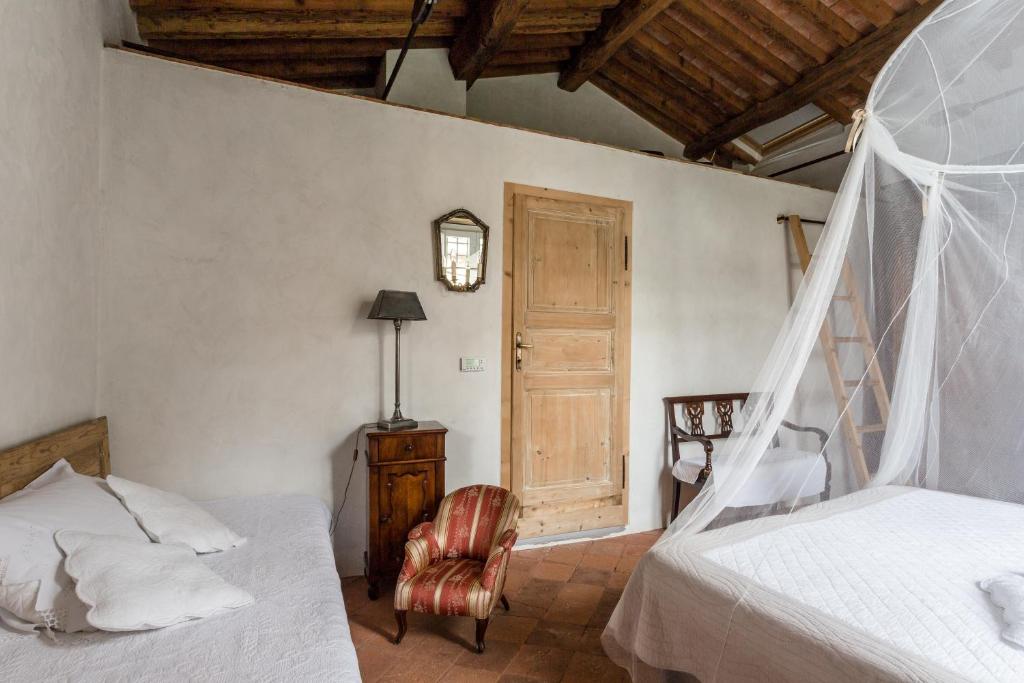 Postel nebo postele na pokoji v ubytování Casa Di Laura