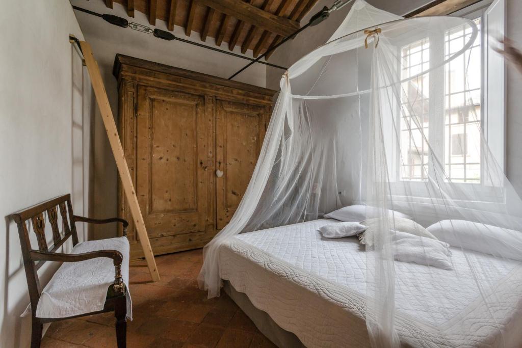 Postel nebo postele na pokoji v ubytování Casa Di Laura