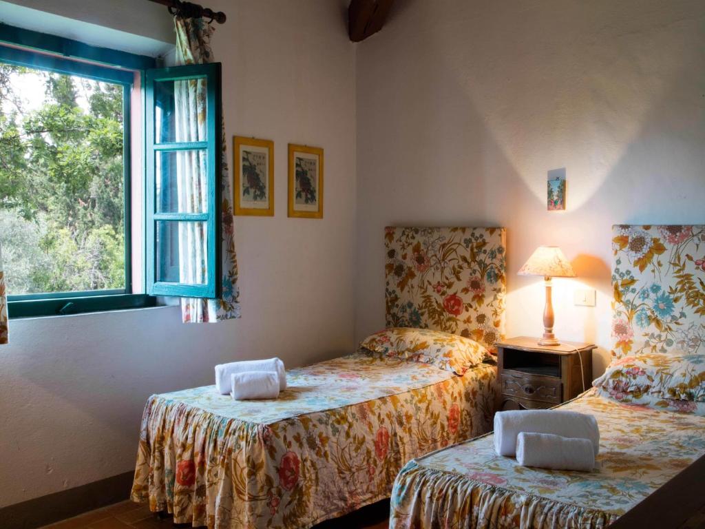 Posteľ alebo postele v izbe v ubytovaní Apartment with large garden and pool on the hills of Pisa