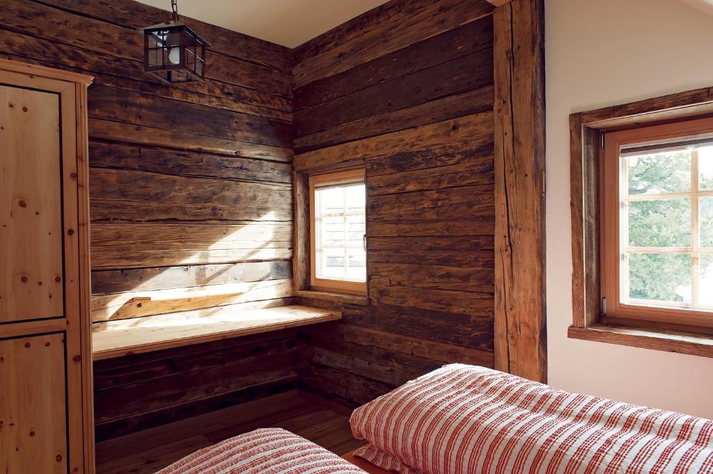 Posteľ alebo postele v izbe v ubytovaní Sandrisser-Hütte