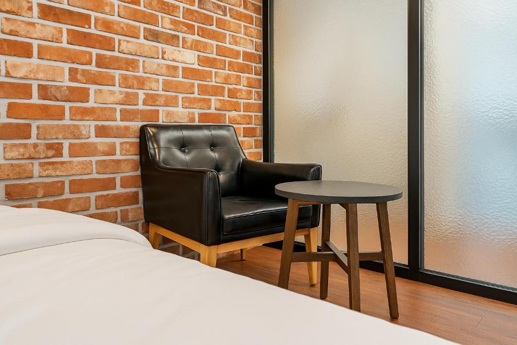 Postel nebo postele na pokoji v ubytování Hotel Lin
