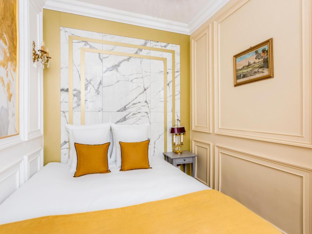 Postel nebo postele na pokoji v ubytování Merveil - Luxury Suite -Champs Elysees-Haussmann I