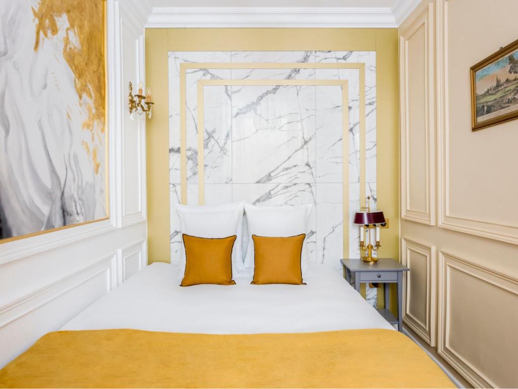 Postel nebo postele na pokoji v ubytování Merveil - Luxury Suite -Champs Elysees-Haussmann I