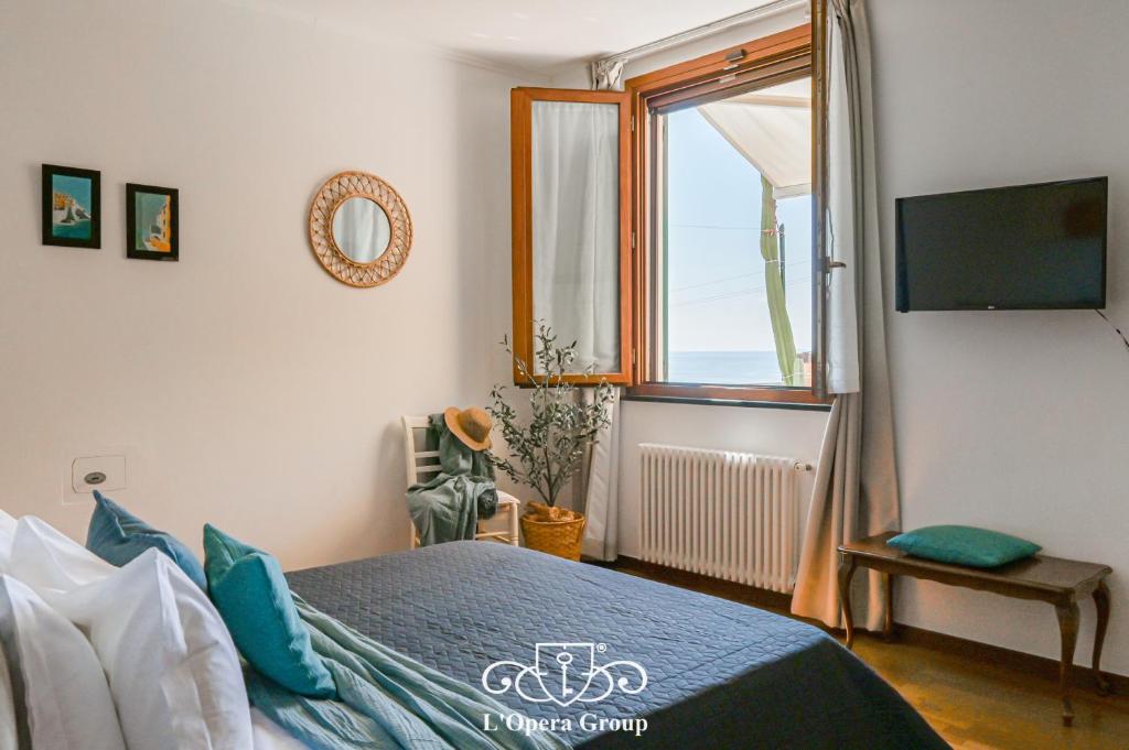 TV a/nebo společenská místnost v ubytování Méa Mare Apartment - L'Opera Group