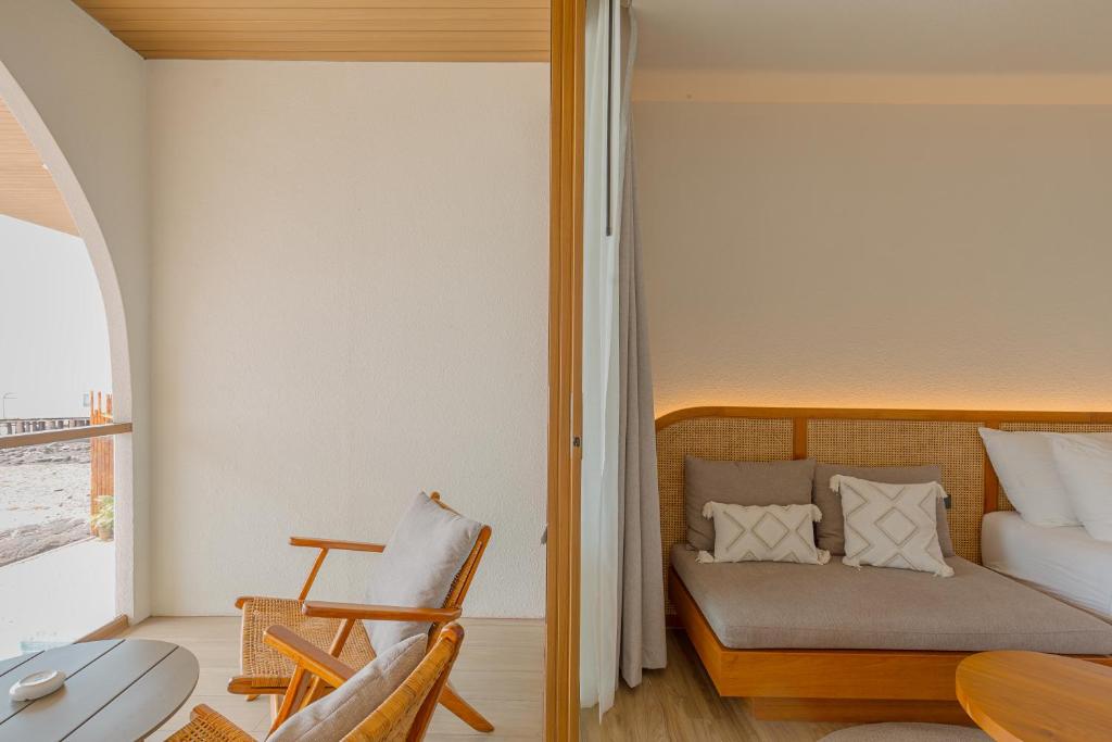 Posezení v ubytování Tasana bar and luxury resort