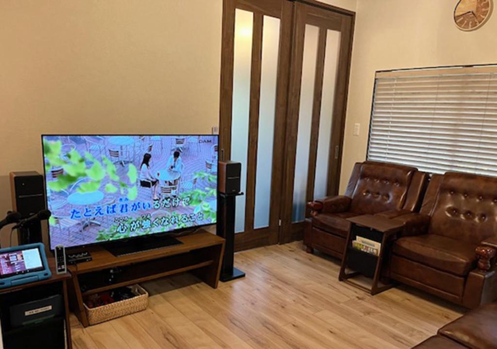 TV a/nebo společenská místnost v ubytování Kitakaruizawa Isshoan ~北軽井沢 一菖庵~