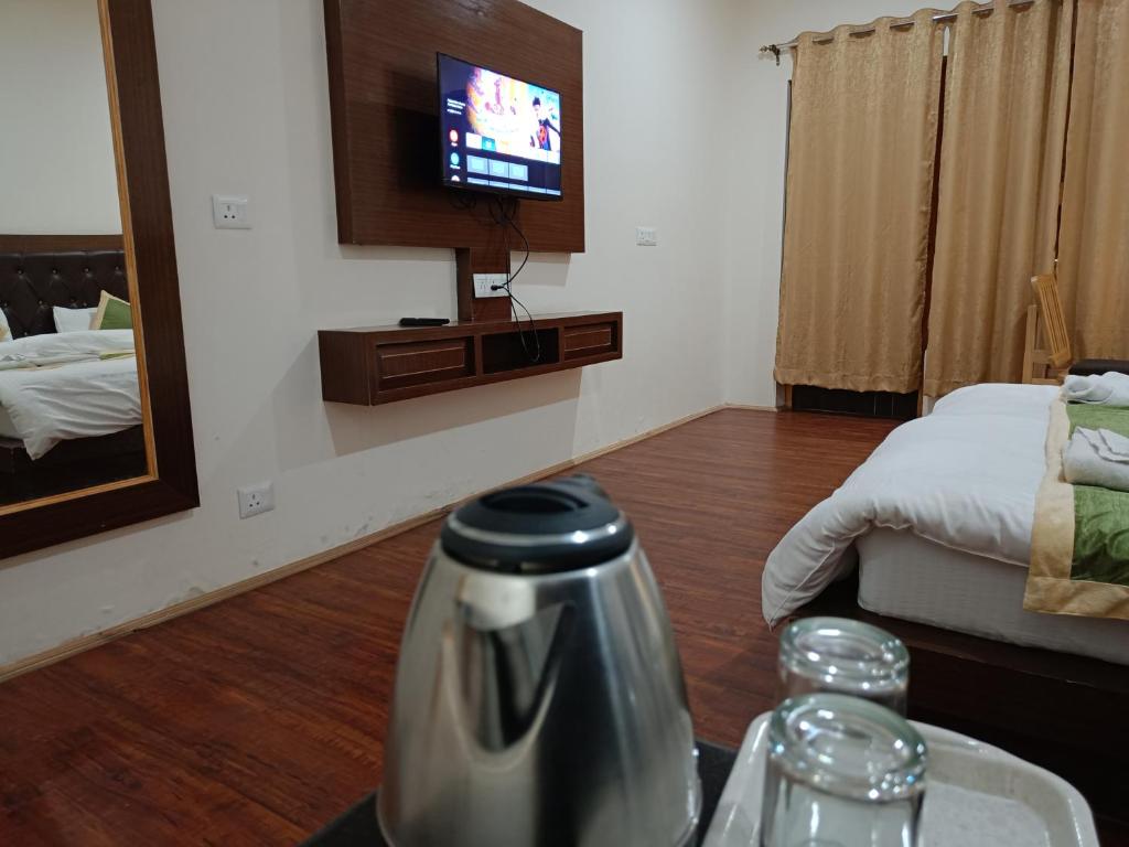Postel nebo postele na pokoji v ubytování Apricus hotel