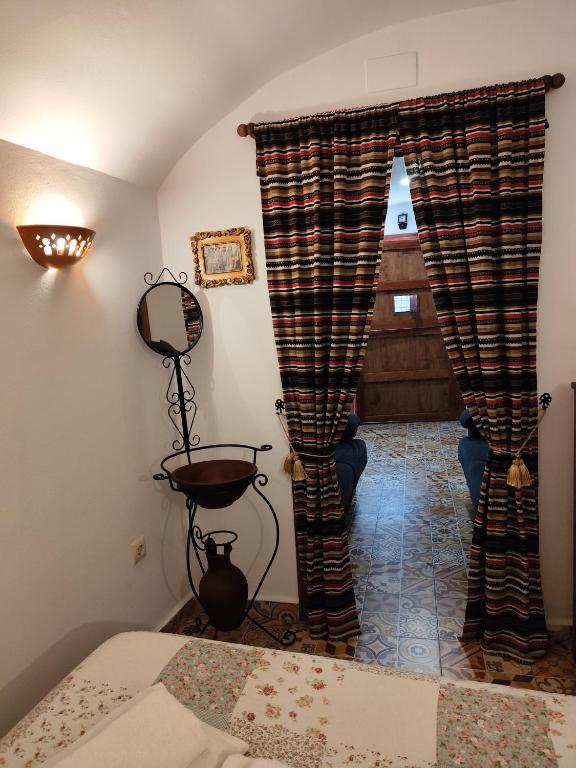 Postel nebo postele na pokoji v ubytování Casa Cueva EL ZAGAL
