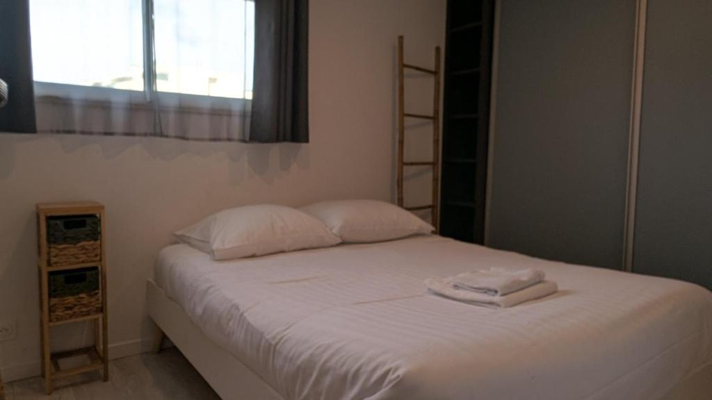 Posteľ alebo postele v izbe v ubytovaní Appartement T3 , 650m du Palais des Festivals