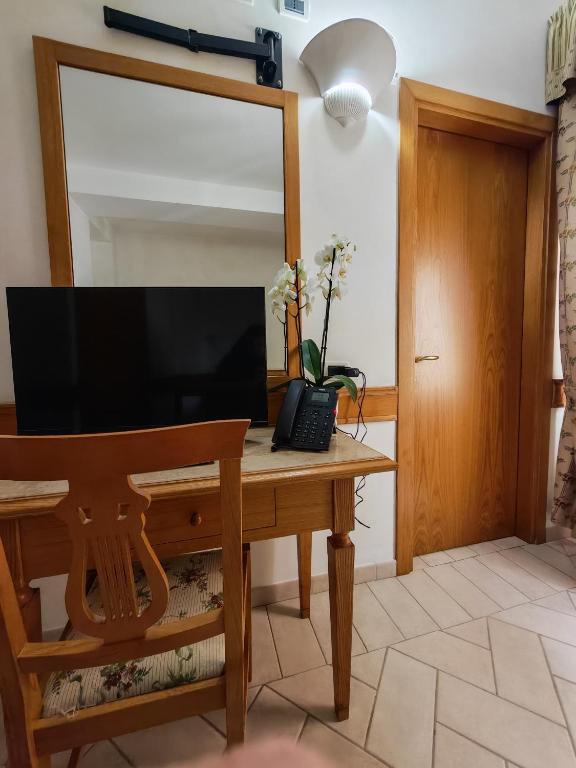 TV a/nebo společenská místnost v ubytování Hotel Pace