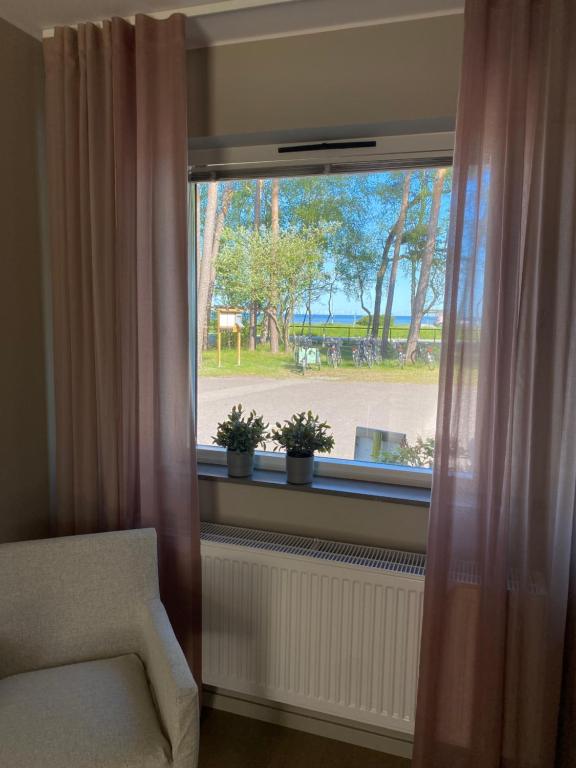 Posezení v ubytování Höllviksnäs möten mat logi