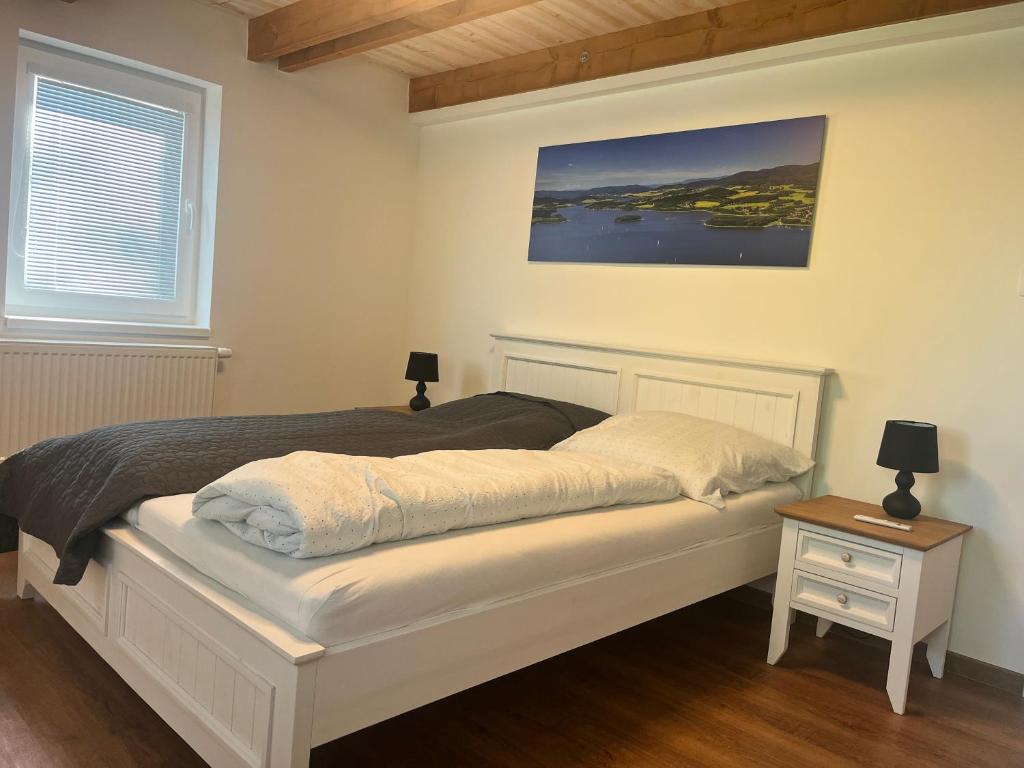Postel nebo postele na pokoji v ubytování Apartment Lipno Hůrka