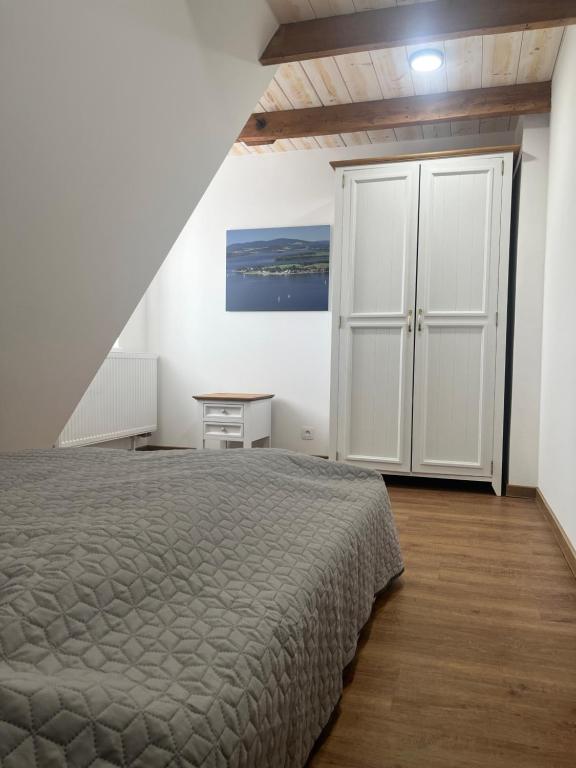 Postel nebo postele na pokoji v ubytování Apartment Lipno Hůrka