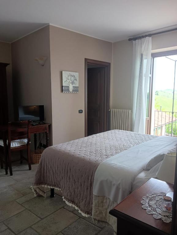 Posteľ alebo postele v izbe v ubytovaní Il Borgo B&B