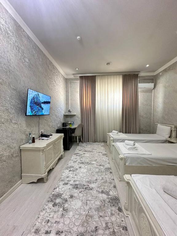 Кровать или кровати в номере Ammar hotel