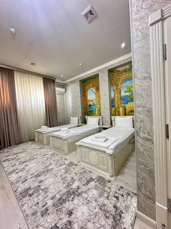Кровать или кровати в номере Ammar hotel