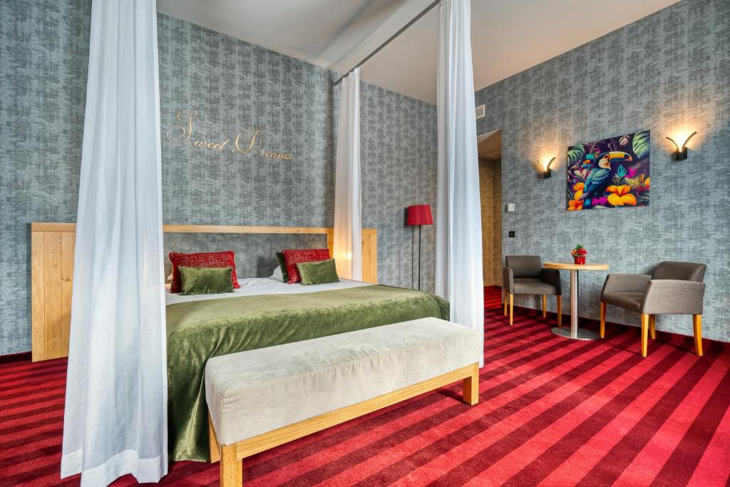 Postel nebo postele na pokoji v ubytování Hotel Verviers Van der Valk