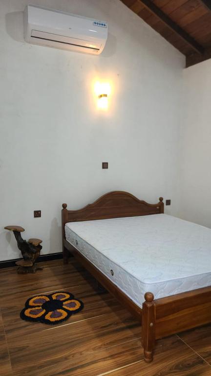 Postel nebo postele na pokoji v ubytování Lion King Jungle Cabanas