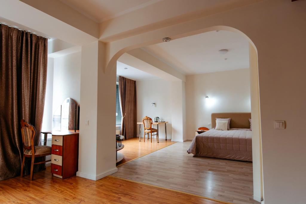 Postel nebo postele na pokoji v ubytování Villa Arus