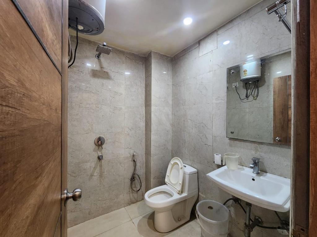 Koupelna v ubytování Hotel Max Marina Delhi Airport