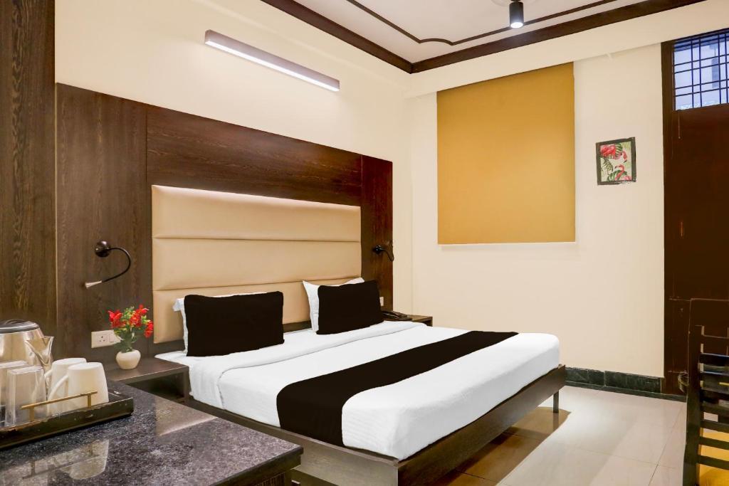Postel nebo postele na pokoji v ubytování Hotel Max Marina Delhi Airport
