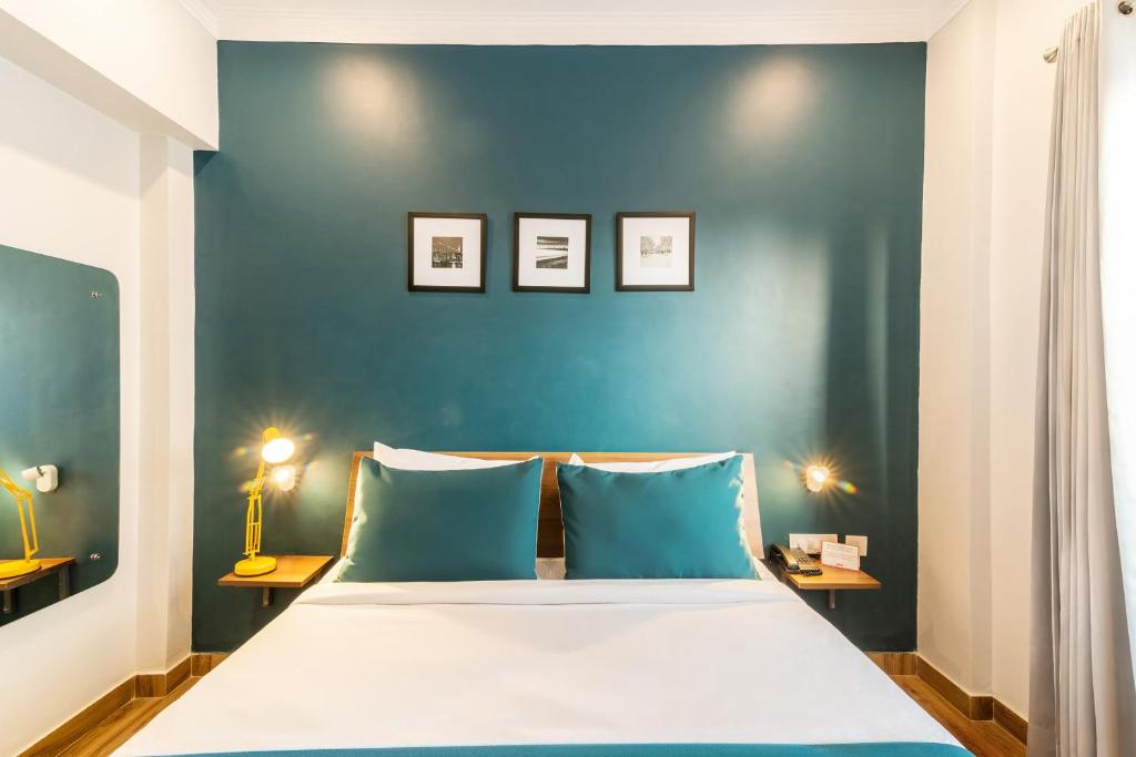 Postel nebo postele na pokoji v ubytování Hotel Max Marina Delhi Airport