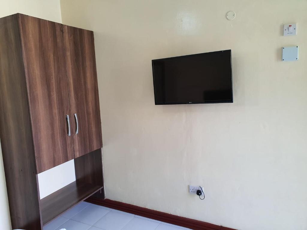 TV a/nebo společenská místnost v ubytování Prestige Leisure Hotel
