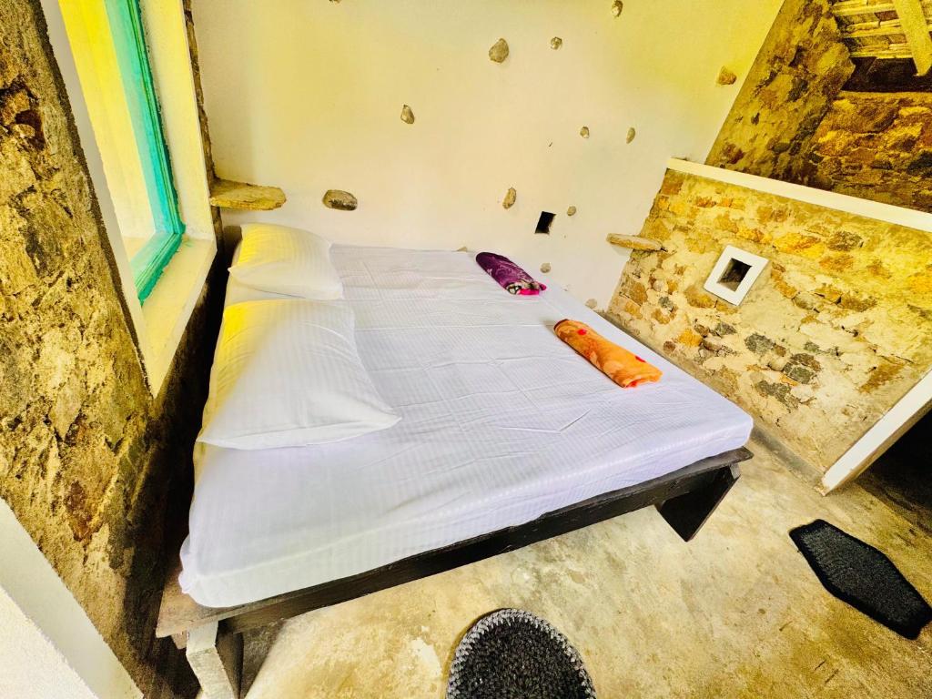 Postel nebo postele na pokoji v ubytování Genderless Jungle
