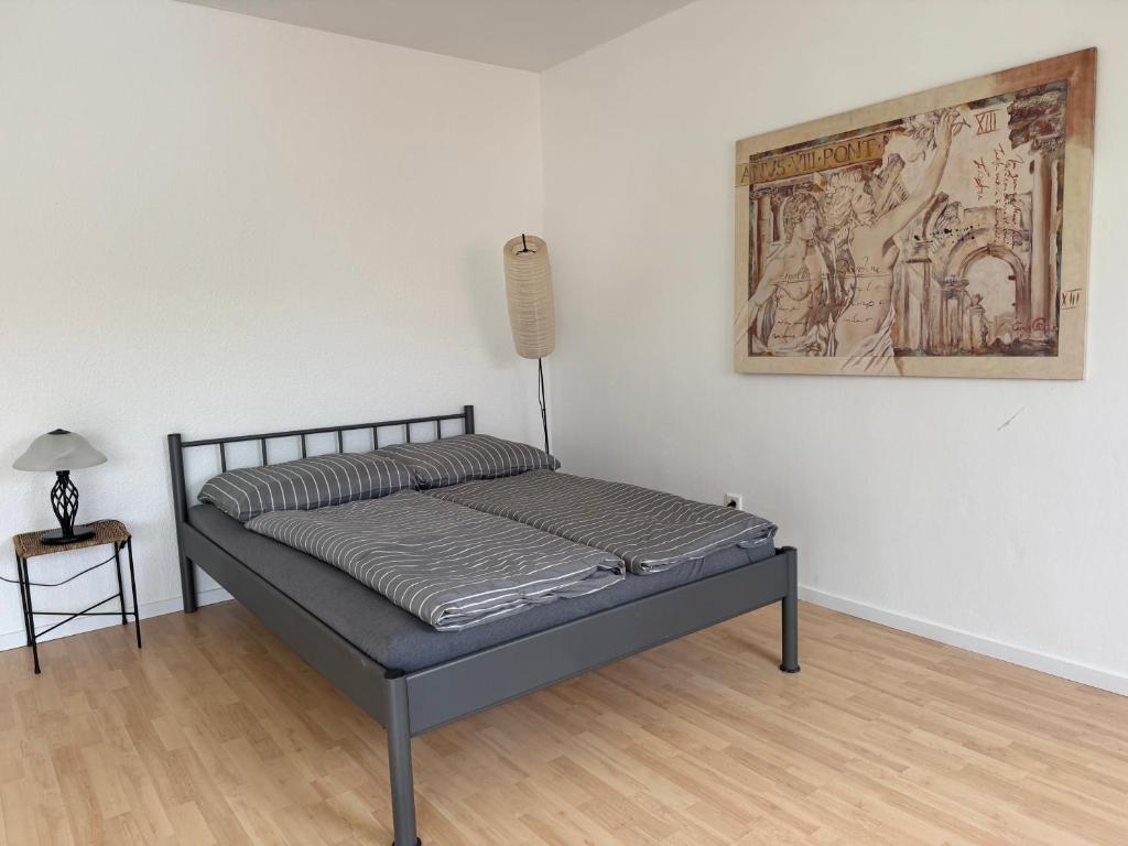 En eller flere senge i et værelse på Vida Real Estate Regelsbach