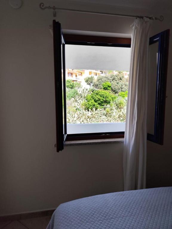 Postel nebo postele na pokoji v ubytování B&B Easy Wind