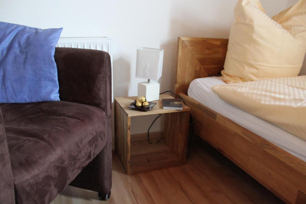 Postel nebo postele na pokoji v ubytování Gästehaus Glaubenstein