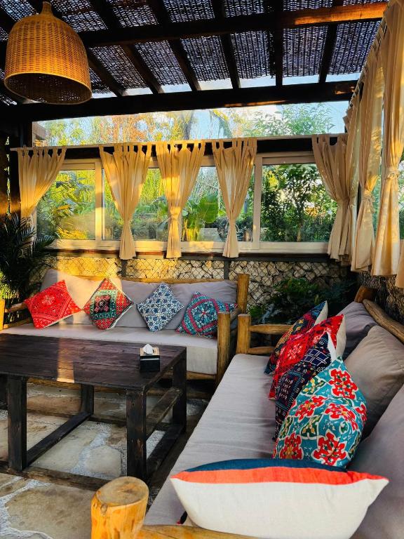 Khu vực ghế ngồi tại PHANSI - Glamping, View Point 360, Bar & BBQ