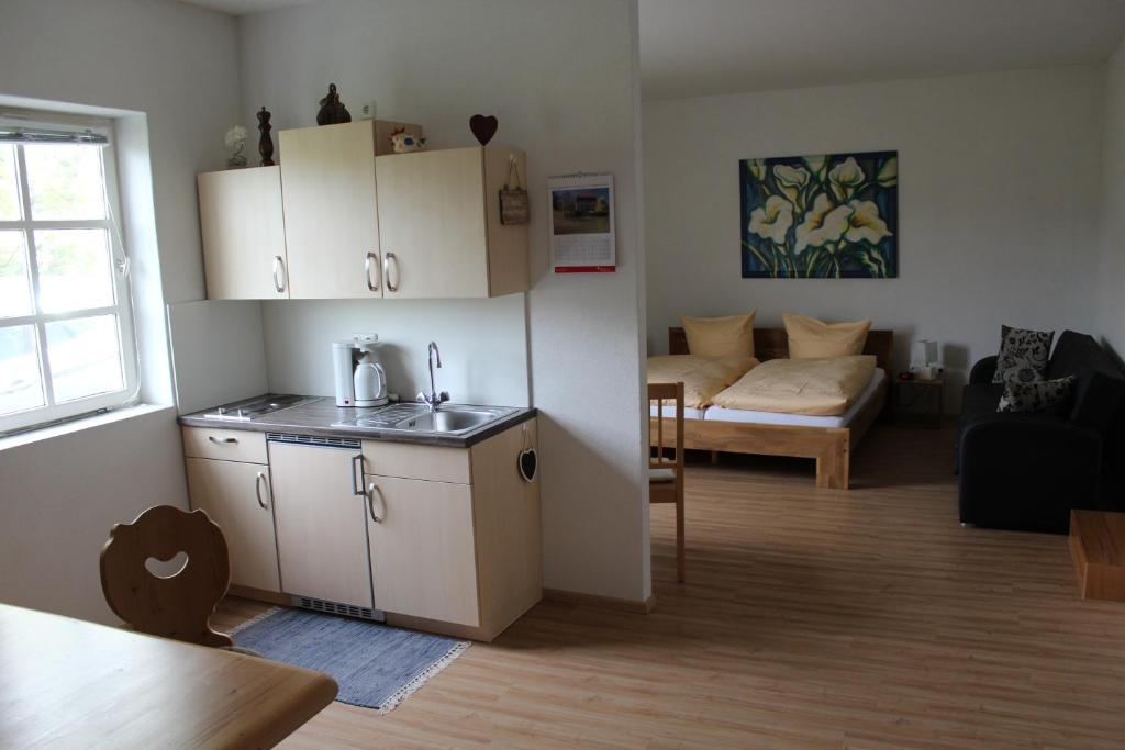 Kuchyň nebo kuchyňský kout v ubytování Gästehaus Glaubenstein