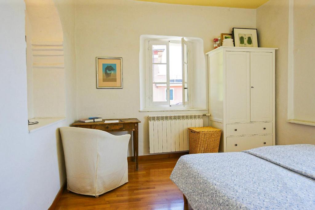 Postel nebo postele na pokoji v ubytování Appartamento Ronco