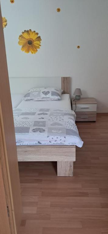 Postel nebo postele na pokoji v ubytování Alpes