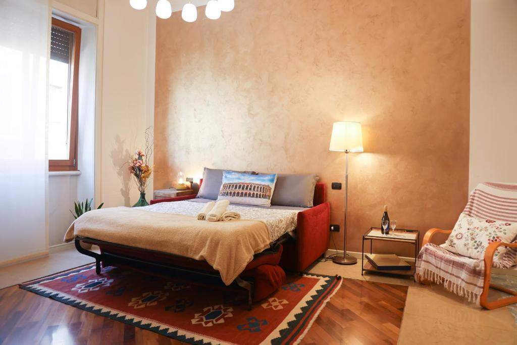 Postel nebo postele na pokoji v ubytování Honey Rooms Verona - camera Millefiori