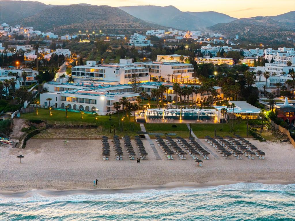 an aerial view of a beach with a resort at One Resort Premium Hammamet in Hammamet Nord