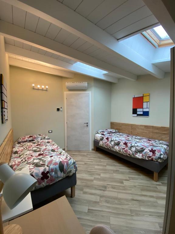 Postel nebo postele na pokoji v ubytování Jacky House 3.0