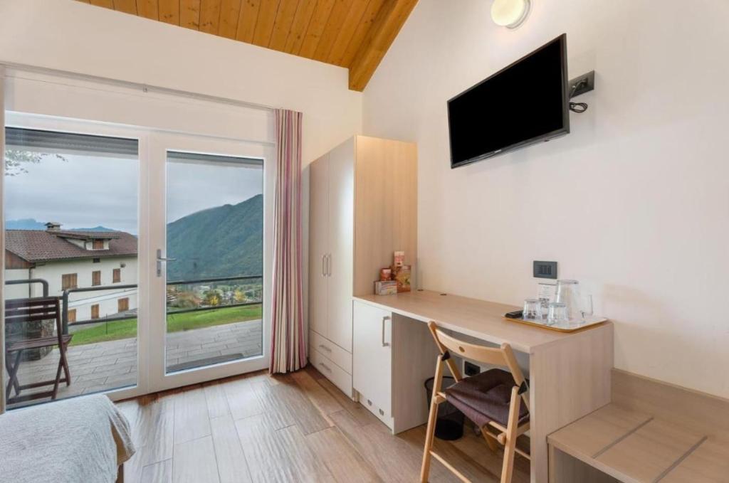 TV a/nebo společenská místnost v ubytování Bed and Breakfast Sanmichele